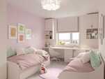 ピンクの壁紙がかわいい子供部屋の写真