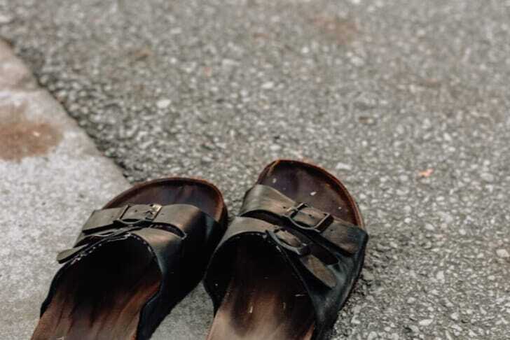pair of black-and-brown leather sandals